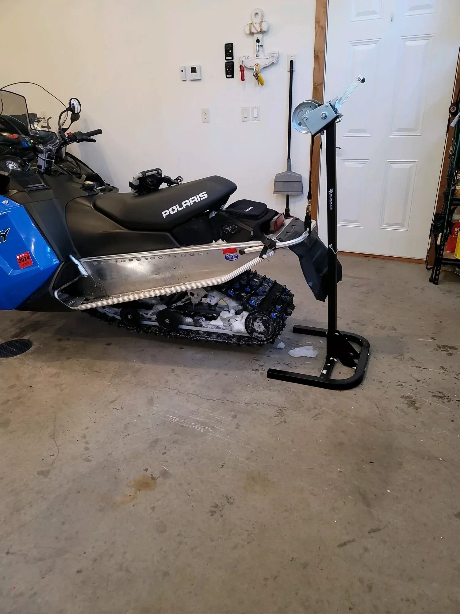 Black Widow Black Ice Snowmobile Lift with Winch | Model SNO-LIFT-WINCH | Base Size 22″ x 18.5″ | Capacity 700 lb | Seasonal Item | For Snowmobile
