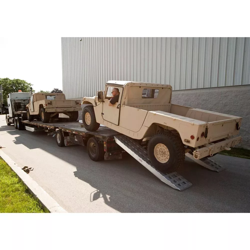 Heavy Duty Ramps 2 Bunk Load Leveler / 2 Ramp System | Model 23-24-096-02-02-MLL-2 | Size 8′ L x 18″ W | 23,500 lb. Capacity | Horsepower 23 HP | For 102″ Step Deck Trailers with 24″ Drop