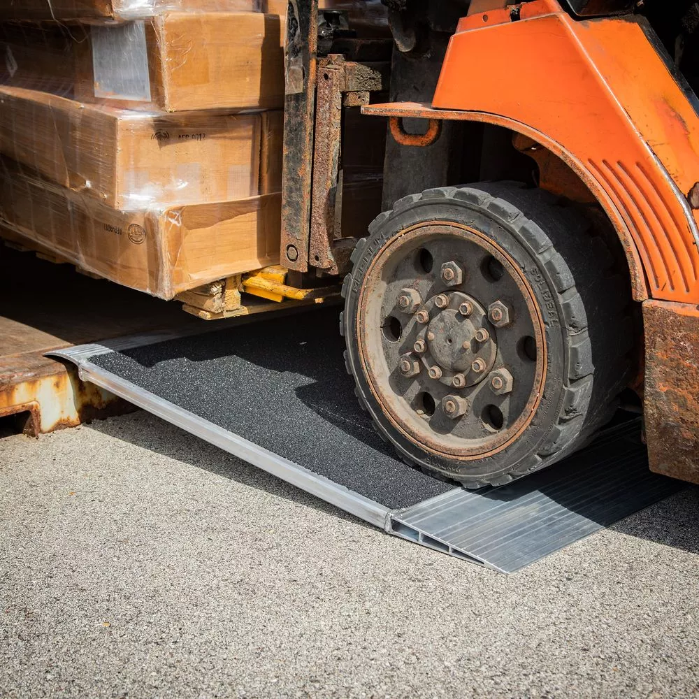 Heavy Duty Ramps Grit-Coat Aluminum Shipping Container Ramp | Model 12-63-060-06-Grit | Size 60″ L x 63″ W | Capacity 12,000 lb | Horsepower 23 HP | For 5.75″–8″ H Lip Shipping Containers