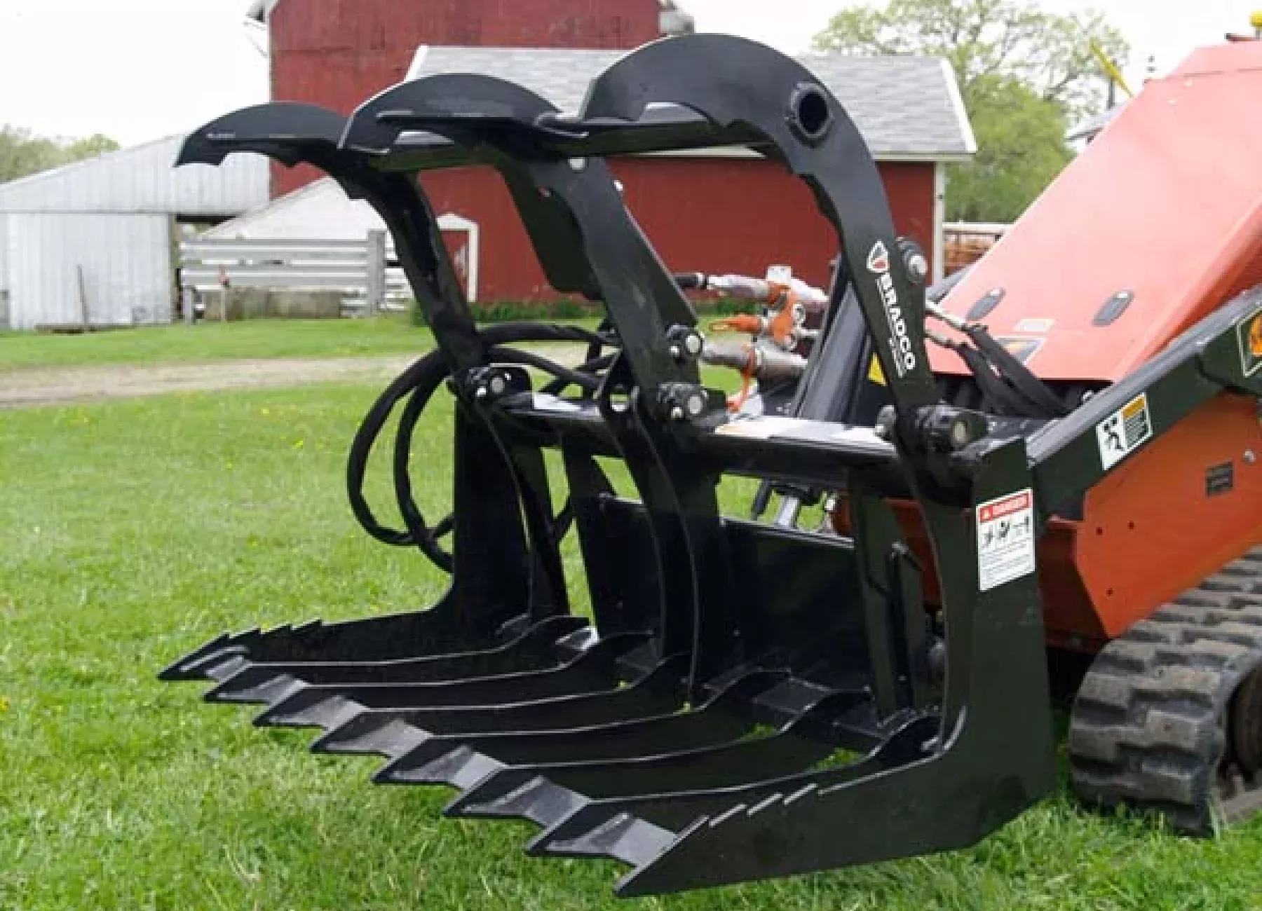 Paladin Brush Grapple | Working Width 72″–84″ | Severe-Duty Open Bottom | 15-20 GPM | For Skid-Steer Loaders